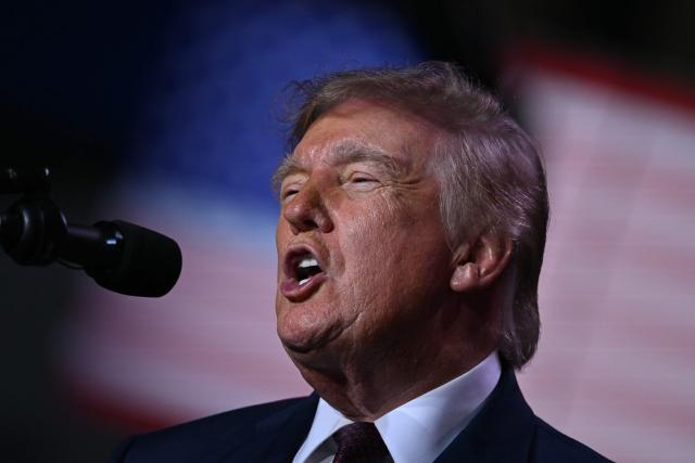 US President Donald Trump speaks during a midterm campaign rally at The Mitchell Center of the University of South Alabama in Mobile, Alabama on October 2, 2026. (Photo by Brendan SMIALOWSKI / AFP)