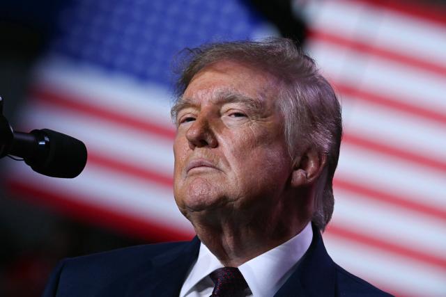 US President Donald Trump speaks during a midterm campaign rally at The Mitchell Center of the University of South Alabama in Mobile, Alabama on October 2, 2026. (Photo by Brendan SMIALOWSKI / AFP)
