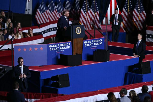 US President Donald Trump speaks during a midterm campaign rally at The Mitchell Center of the University of South Alabama in Mobile, Alabama on October 2, 2026. (Photo by Brendan SMIALOWSKI / AFP)