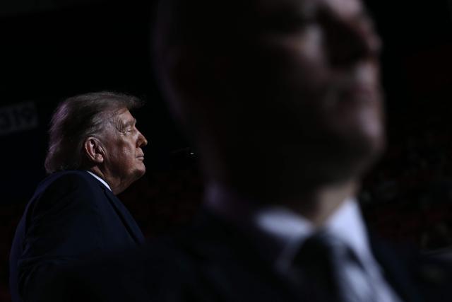 US President Donald Trump is seen on stage during a midterm campaign rally at The Mitchell Center of the University of South Alabama in Mobile, Alabama on October 2, 2026. (Photo by Brendan SMIALOWSKI / AFP)