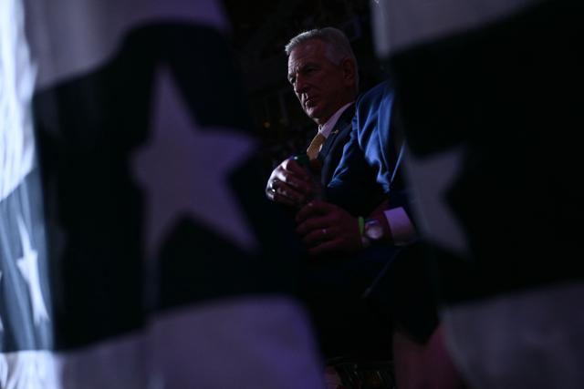 US Senator Tommy Tuberville (R-AL) watches US President Donald Trump speak during a midterm campaign rally at The Mitchell Center of the University of South Alabama in Mobile, Alabama on October 2, 2026. (Photo by Brendan SMIALOWSKI / AFP)
