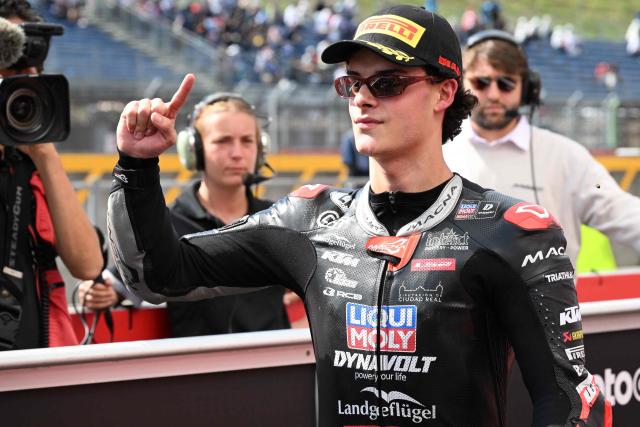 Liqui Moly Dynavolt Intract GP rider David Almansa of Spain celebrates his pole position at the Parc Ferme of the Moto3 class qualifying session of MotoGP Japanese Grand Prix at the Mobility Resort Motegi in Motegi, Tochigi prefecture on October 3, 2026. (Photo by Toshifumi KITAMURA / AFP)