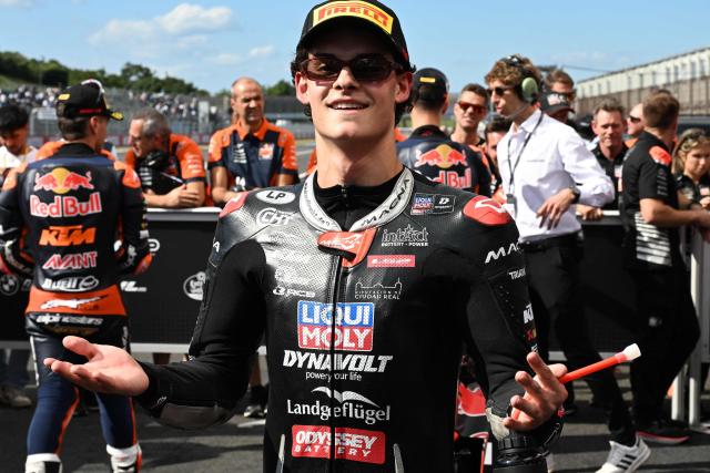 Liqui Moly Dynavolt Intract GP rider David Almansa of Spain celebrates his pole position at the Parc Ferme of the Moto3 class qualifying session of MotoGP Japanese Grand Prix at the Mobility Resort Motegi in Motegi, Tochigi prefecture on October 3, 2026. (Photo by Toshifumi KITAMURA / AFP)
