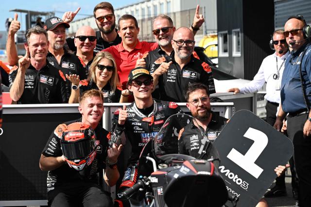 Liqui Moly Dynavolt Intract GP rider David Almansa of Spain celebrates his pole position at the Parc Ferme of the Moto3 class qualifying session of MotoGP Japanese Grand Prix at the Mobility Resort Motegi in Motegi, Tochigi prefecture on October 3, 2026. (Photo by Toshifumi KITAMURA / AFP)