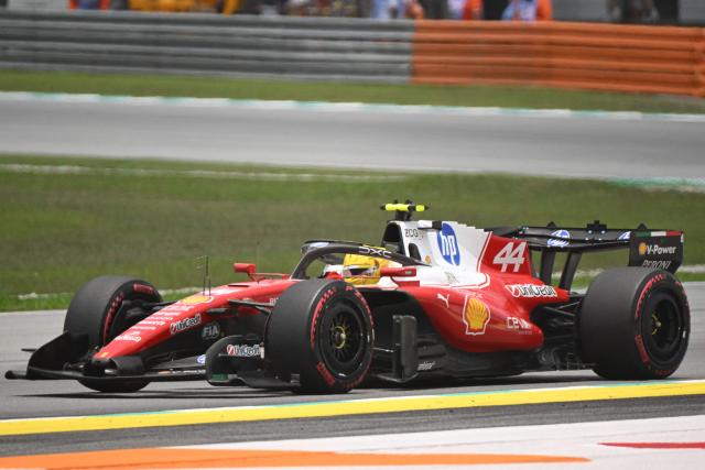 Ferrari's British driver Lewis Hamilton steers his car during the third practice session ahead of the Formula One Bahrain Grand Prix in Sepang on October 3, 2026. (Photo by JADE GAO / AFP)