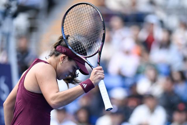 Colombia´s Camila Osorio reacts during the women's singles second round tennis match against  USA's Coco Gauff at the China Open tennis tournament in Beijing on October 3, 2026. (Photo by WANG Zhao / AFP)