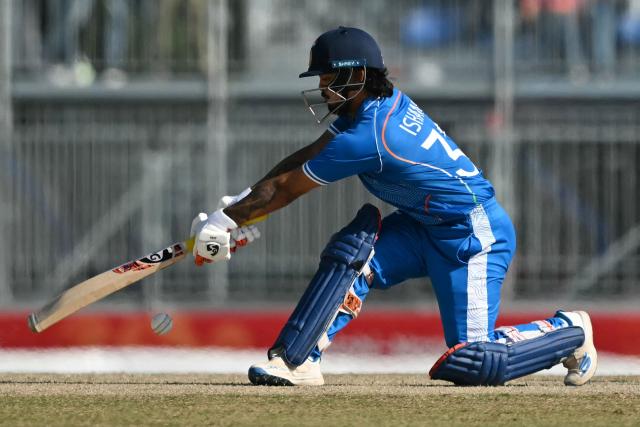 India's Ishan Kishan sweeps the ball during the men's cricket final match between Pakistan and India during the 2026 Asian Games at the Korogi Athletic Park in Nisshin on October 3, 2026. (Photo by ANDREW CABALLERO-REYNOLDS / AFP)