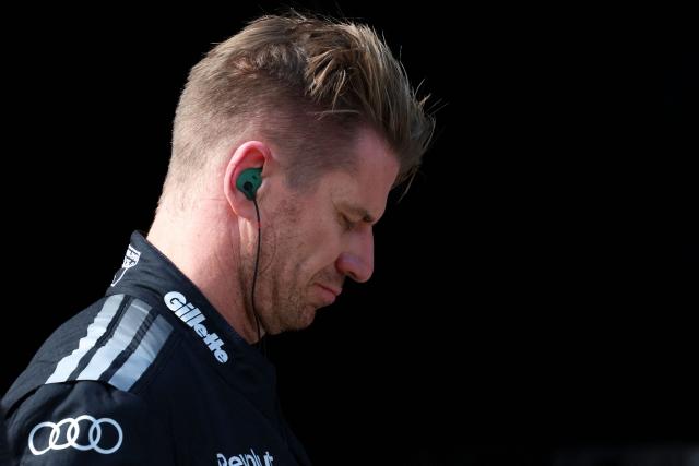 Audi's German driver Nico Hulkenberg walks during the qualifying session of the Formula One Bahrain Grand Prix in Sepang on October 3, 2026. (Photo by Annice Lyn / POOL / AFP)