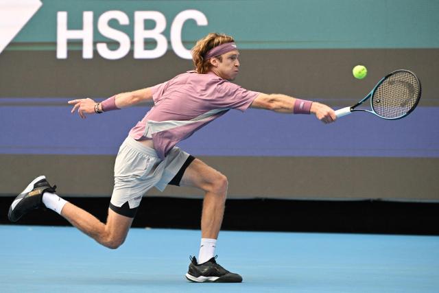 Russia’s Andrey Rublev hits a return to compatriot Roman Safiullin in their men’s singles match at the China Open tennis tournament in Beijing on October 3, 2026. (Photo by GREG BAKER / AFP)
