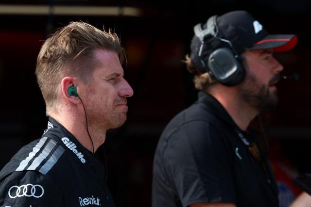 Audi's German driver Nico Hulkenberg walks during the qualifying session of the Formula One Bahrain Grand Prix in Sepang on October 3, 2026. (Photo by Annice Lyn / POOL / AFP)
