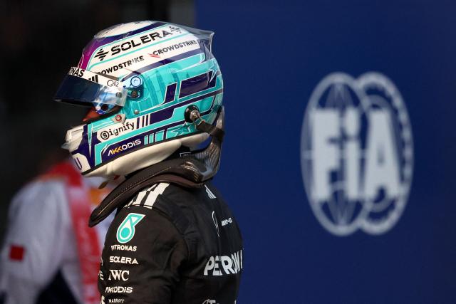 Mercedes' Italian driver Kimi Antonelli walks after the qualifying session of the Formula One Bahrain Grand Prix in Sepang on October 3, 2026. (Photo by Annice Lyn / POOL / AFP)