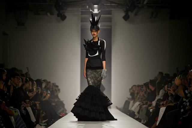 A model presents a creation for Junya Watanabe Women's Spring/Summer 2027 collection fashion show as part of the Paris Fashion Week, in Paris on October 3, 2026. (Photo by LOU BENOIST / AFP)