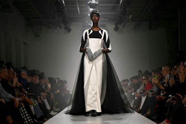 A model presents a creation for Junya Watanabe Women's Spring/Summer 2027 collection fashion show as part of the Paris Fashion Week, in Paris on October 3, 2026. (Photo by LOU BENOIST / AFP)