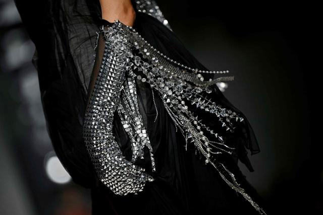 A model presents a creation for Junya Watanabe Women's Spring/Summer 2027 collection fashion show as part of the Paris Fashion Week, in Paris on October 3, 2026. (Photo by LOU BENOIST / AFP)