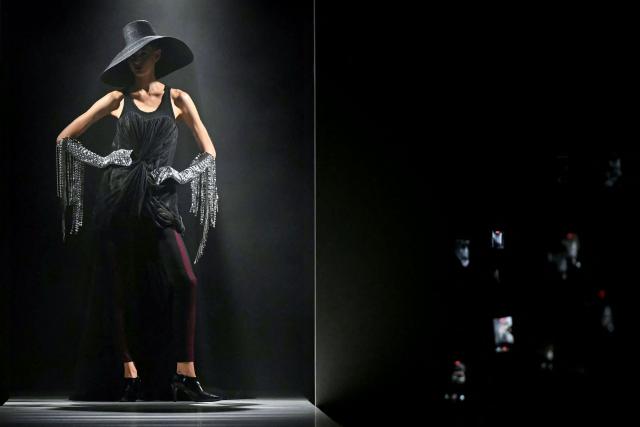 A model presents a creation for Junya Watanabe Women's Spring/Summer 2027 collection fashion show as part of the Paris Fashion Week, in Paris on October 3, 2026. (Photo by LOU BENOIST / AFP)
