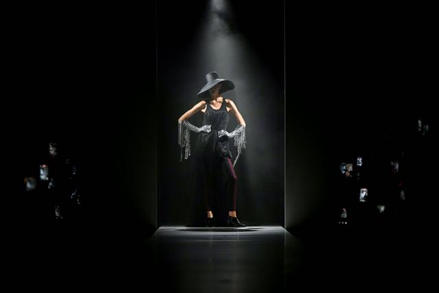TOPSHOT - A model presents a creation for Junya Watanabe Women's Spring/Summer 2027 collection fashion show as part of the Paris Fashion Week, in Paris on October 3, 2026. (Photo by LOU BENOIST / AFP)