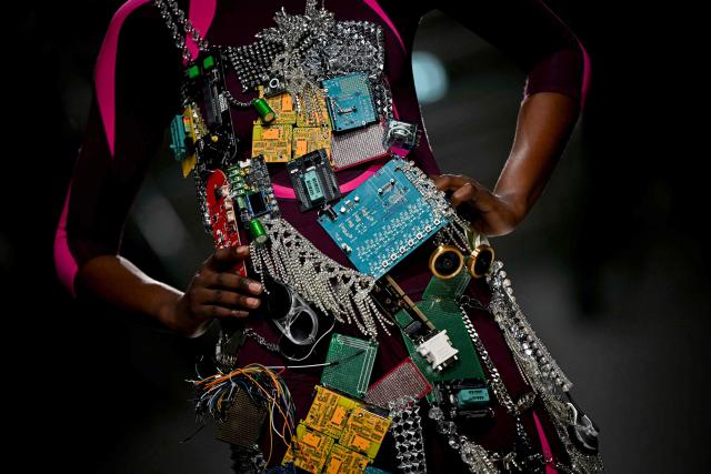 A model presents a creation for Junya Watanabe Women's Spring/Summer 2027 collection fashion show as part of the Paris Fashion Week, in Paris on October 3, 2026. (Photo by LOU BENOIST / AFP)