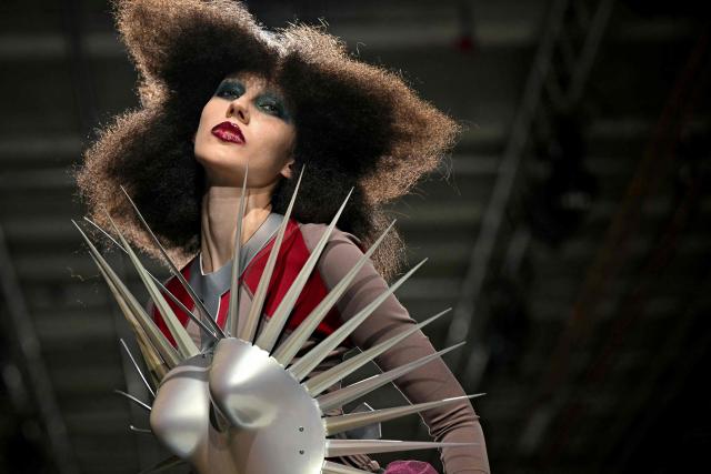 A model presents a creation for Junya Watanabe Women's Spring/Summer 2027 collection fashion show as part of the Paris Fashion Week, in Paris on October 3, 2026. (Photo by LOU BENOIST / AFP)