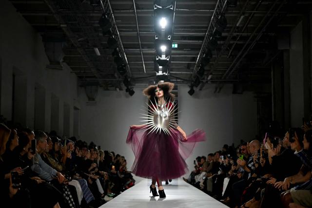 A model presents a creation for Junya Watanabe Women's Spring/Summer 2027 collection fashion show as part of the Paris Fashion Week, in Paris on October 3, 2026. (Photo by LOU BENOIST / AFP)