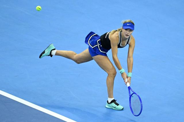 Russia's Anna Kalinskaya hits a return to China's Zheng Qinwen during their women's singles second round tennis match at the China Open tennis tournament in Beijing on October 3, 2026. (Photo by WANG Zhao / AFP)