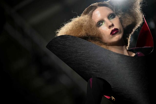 A model presents a creation for Junya Watanabe Women's Spring/Summer 2027 collection fashion show as part of the Paris Fashion Week, in Paris on October 3, 2026. (Photo by LOU BENOIST / AFP)