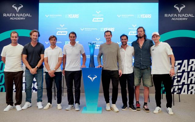 (From L) French tennis player Richard Gasquet, Spanish tennis players Carlos Moya, David Ferrer and Rafael Nadal, Scottish tennis player Andy Murray, Italian tennis player Fabio Fognini, Russian tennis player Marat Safin and Austrian tennis player Dominic Thiem pose prior an event to celebrate Rafael Nadal academy's 10th anniversary in Manacor on the Spanish Balearic Island of Mallorca on October 3, 2026. (Photo by MANU QUINTERO / AFP)