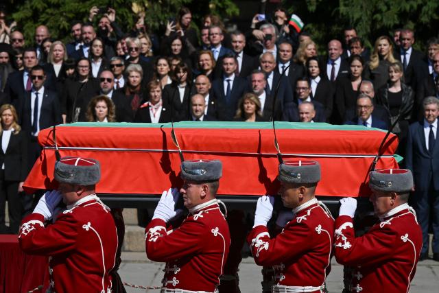 Bulgarian army honour guards carry a coffin bearing the remains of Tsar Samuel, one of the last major rulers of the First Bulgarian Empire, during a ceremony for its return to Bulgaria more than 1,000 years after his death, in Sofia on October 3, 2026. Greece and Bulgaria reached an agreement on the return of the remains with the Bulgarian prime minister hailing the accord as "historic". Athens will in return receive 48 objects pillaged by Bulgarian troops from churches and monasteries in northern Greece during World War I. (Photo by Nikolay DOYCHINOV / AFP)