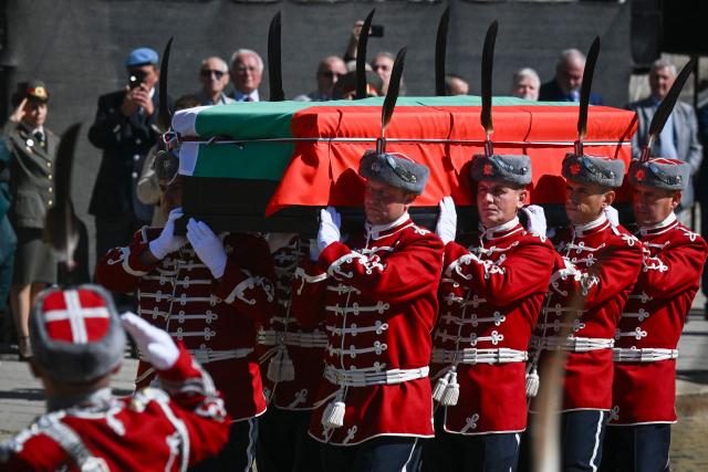 Bulgarian army honour guards carry a coffin bearing the remains of Tsar Samuel, one of the last major rulers of the First Bulgarian Empire, during a ceremony for its return to Bulgaria more than 1,000 years after his death, in Sofia on October 3, 2026. Greece and Bulgaria reached an agreement on the return of the remains with the Bulgarian prime minister hailing the accord as "historic". Athens will in return receive 48 objects pillaged by Bulgarian troops from churches and monasteries in northern Greece during World War I. (Photo by Nikolay DOYCHINOV / AFP)