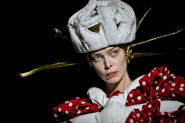 Belarus model Tanya Dziahileva presents a creation for Comme des Garcons Women's Spring/Summer 2027 collection fashion show as part of the Paris Fashion Week, in Paris on October 3, 2026. (Photo by LOU BENOIST / AFP)