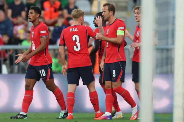 England's midfielder #10 Jude Bellingham (L) celebatres scoring his team's second goal with teammates during the UEFA Nations League, league A day 3: Group 3, football match between Croatia and England at the Stadion HNK Rijeka stadium in Rijeka, Croatia, on October 3, 2026. (Photo by MARKO PERKOV / AFP)