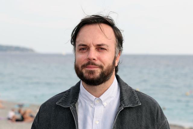 French actor Jeremy Lopez poses during a photocall for the film "Instinct de famille" as part of the 8th edition of the Cineroman film festival in Nice, French Riviera, on October 3, 2026. (Photo by Valery HACHE / AFP)