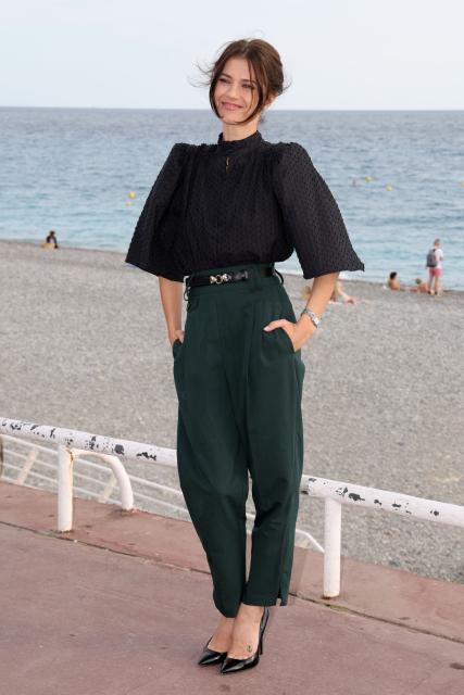 French actress Alice Dufour poses during a photocall for the film "Instinct de famille" as part of the 8th edition of the Cineroman film festival in Nice, French Riviera, on October 3, 2026. (Photo by Valery HACHE / AFP)