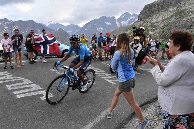 (FILES) Colombia's Nairo Quintana leads the race during the eighteenth stage of the 106th edition of the Tour de France cycling race between Embrun and Valloire, in Valloire, on July 25, 2019. Quintana, the son of a farming family in the Andes, turned into a daring beetle who shook Colombia to its core, fighting epic battles that made him a legend. (Photo by JEFF PACHOUD / AFP)