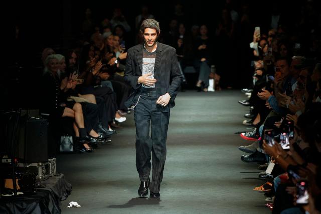 Belgian-born Italian fashion designer Stefano Gallici for Ann Demeulemeester aknowledges the audience at the end of the Ann Demeulemeester Women's Spring/Summer 2027 collection fashion show as part of the Paris Fashion Week, in Paris on October 3, 2026. (Photo by GEOFFROY VAN DER HASSELT / AFP)