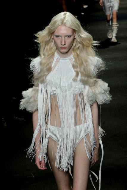 A model presents a creation for Ann Demeulemeester Women's Spring/Summer 2027 collection fashion show as part of the Paris Fashion Week, in Paris on October 3, 2026. (Photo by GEOFFROY VAN DER HASSELT / AFP)