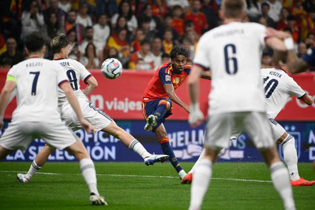Spain's forward #19 Lamine Yamal scores the opening goal during the UEFA Nations League Group A3 football match between Spain and the Czech Republic at the Carlos Tartiere Stadium in Oviedo on October 3, 2026 (Photo by Miguel RIOPA / AFP)