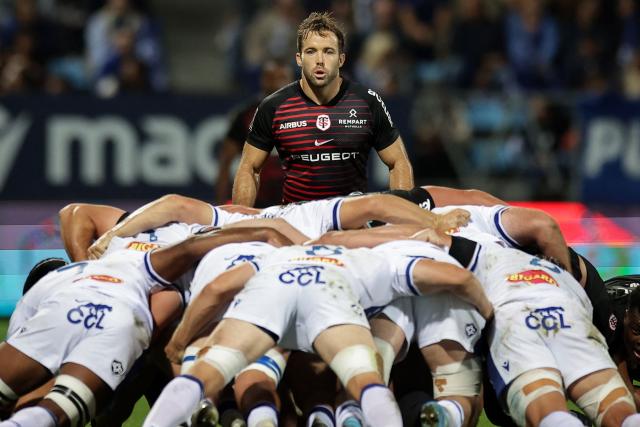 Toulouse's French scrum-half Paul Graou looks at the scrum during the French Top14 rugby union match between Castres Olympique and Stade Toulousain at Stade Pierre Fabre in Castres, southwestern France, on October 3, 2026. (Photo by Valentine CHAPUIS / AFP)