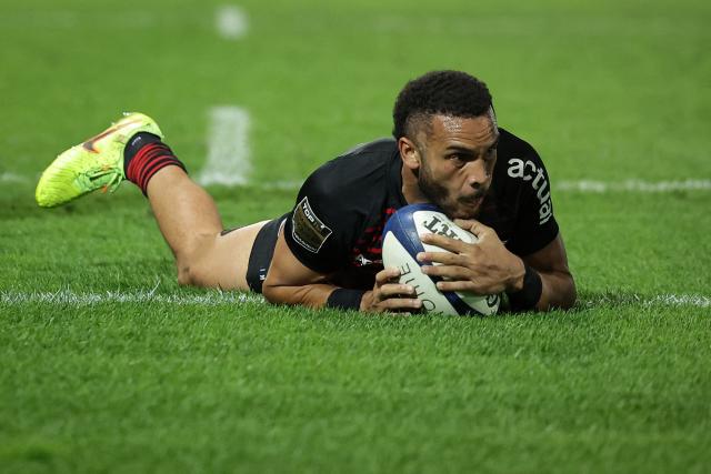 Toulouse's French wing Matthis Lebel scores his team first try during the French Top14 rugby union match between Castres Olympique and Stade Toulousain at Stade Pierre Fabre in Castres, southwestern France, on October 3, 2026. (Photo by Valentine CHAPUIS / AFP)
