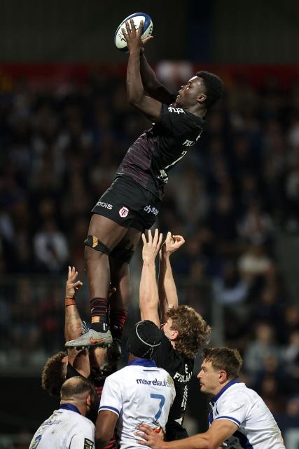 Toulouse's French flanker Marc-Elie Kouassi grabs the ball in a line out during the French Top14 rugby union match between Castres Olympique and Stade Toulousain at Stade Pierre Fabre in Castres, southwestern France, on October 3, 2026. (Photo by Valentine CHAPUIS / AFP)