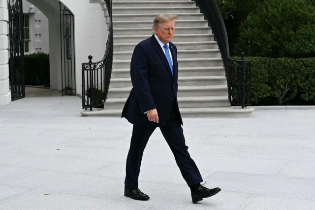 US President Donald Trump walks to board Marine One on the South Lawn of the White House, in Washington, DC, on October 3, 2026. President Trump is travelling to Ohio for a midterm campaign rally. (Photo by Alex WROBLEWSKI / AFP)