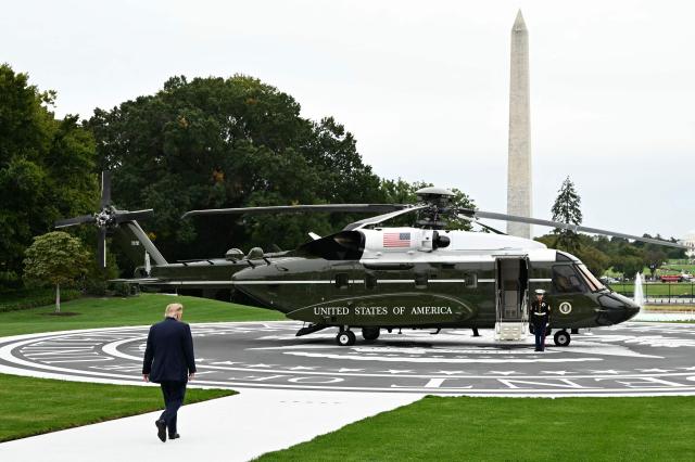 US President Donald Trump walks to board Marine One on the South Lawn of the White House, in Washington, DC, on October 3, 2026. President Trump is travelling to Ohio for a midterm campaign rally. (Photo by Alex WROBLEWSKI / AFP)