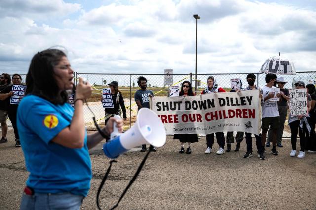 Demonstrators protest in support of families detained inside the Dilley Detention Center in Dilley, Texas on October 3, 2026. (Photo by RONALDO SCHEMIDT / AFP)