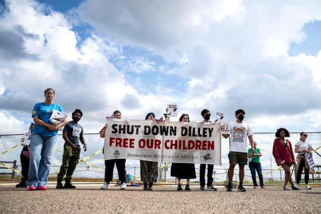 Demonstrators protest in support of families detained inside the Dilley Detention Center in Dilley, Texas on October 3, 2026. (Photo by RONALDO SCHEMIDT / AFP)