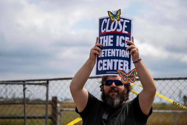 Demonstrators protest in support of families detained inside the Dilley Detention Center in Dilley, Texas on October 3, 2026. (Photo by RONALDO SCHEMIDT / AFP)