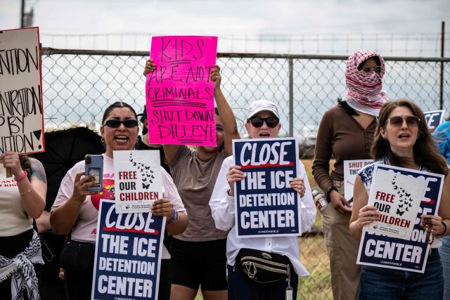 Demonstrators protest in support of families detained inside the Dilley Detention Center in Dilley, Texas on October 3, 2026. (Photo by RONALDO SCHEMIDT / AFP)
