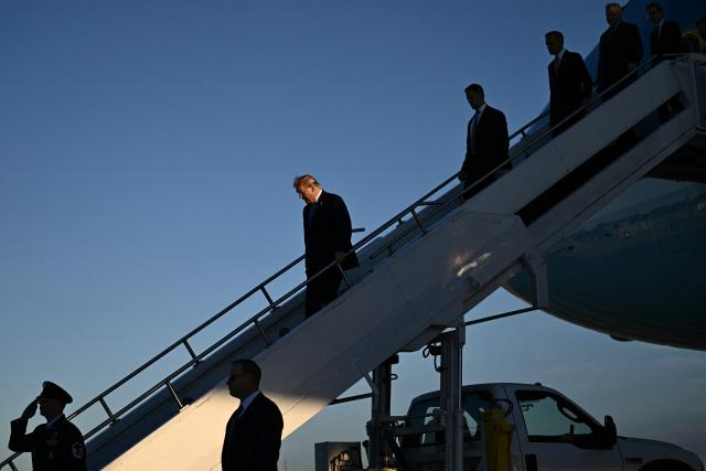 US President Donald Trump steps off Air Force One upon arrival to Dayton International Airport in Ohio, on October 3, 2026. Trump will speak at a campaign rally in support of Republican Senator Jon Husted. (Photo by Brendan SMIALOWSKI / AFP)