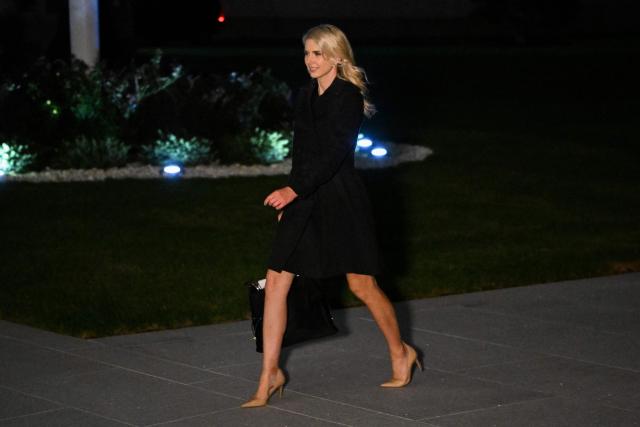 Executive assistant to US President Donald Trump, Natalie Harp, walks to the White House from Marine One on the South Lawn in Washington, DC, on October 3, 2026. President Trump is returning from Ohio where he spoke at a midterm campaign rally. (Photo by Alex WROBLEWSKI / AFP)