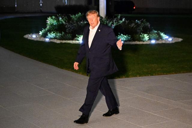 US President Donald Trump gives a thumbs up as he walks to the White House after disembarking from Marine One on the South Lawn in Washington, DC, on October 3, 2026. President Trump is returning from Ohio where he spoke at a midterm campaign rally. (Photo by Alex WROBLEWSKI / AFP)