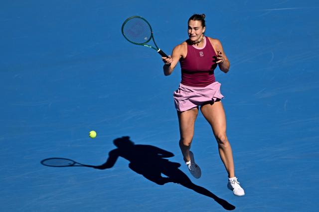 Belarus's Aryna Sabalenka hits a return to Czech Republic's Nikola Bartunkova during their women's singles match at the China Open tennis tournament in Beijing on October 4, 2026. (Photo by Pedro PARDO / AFP)