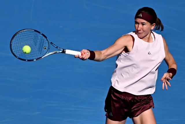 Czech Republic's Nikola Bartunkova hits a return to Belarus's Aryna Sabalenka during their women's singles match at the China Open tennis tournament in Beijing on October 4, 2026. (Photo by Pedro PARDO / AFP)